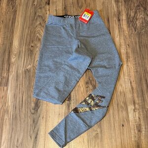 Nike Women’s Gray Leggings with Metallic Gold Logo Detail